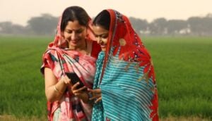 Digital Wage Payments Rural women using phone in village