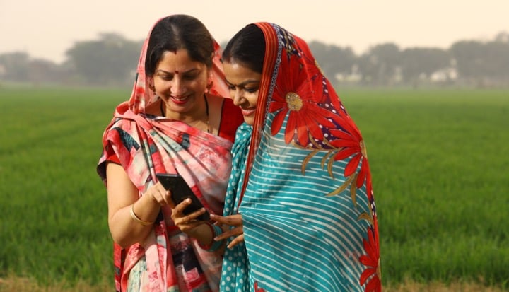 Digital Wage Payments Rural women using phone in village